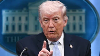 Donald Trump points as he speaks