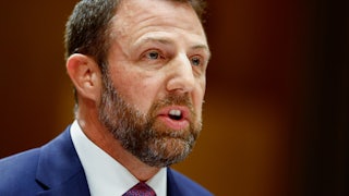 Senator Markwayne Mullin speaks during his Senate committee confirmation as the next secretary of the Department of Homeland Security.