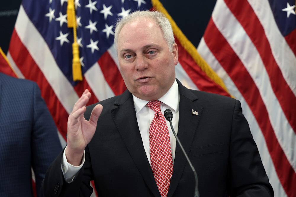 Steve Scalise speaks in front of an American flag.
