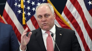 Steve Scalise speaks in front of an American flag.