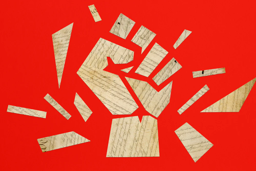 Illustration of pieces of the handwritten U.S. Constitution arranged into the shape of a raised fist on a red background