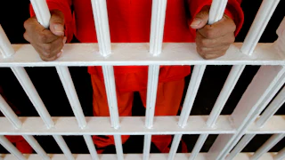 An inmate inside a cell