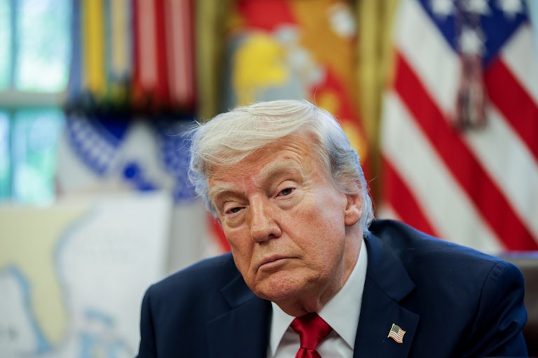 Donald Trump sits in the White House with his eyelids drooping.