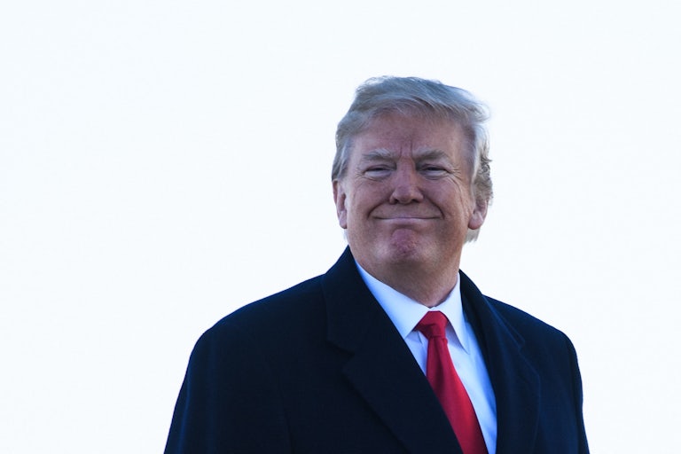 Donald Trump boards Air Force One before departing from Andrews Air Force Base in Maryland.