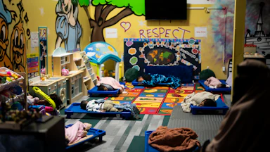 Children sleep during nap time at a daycare.