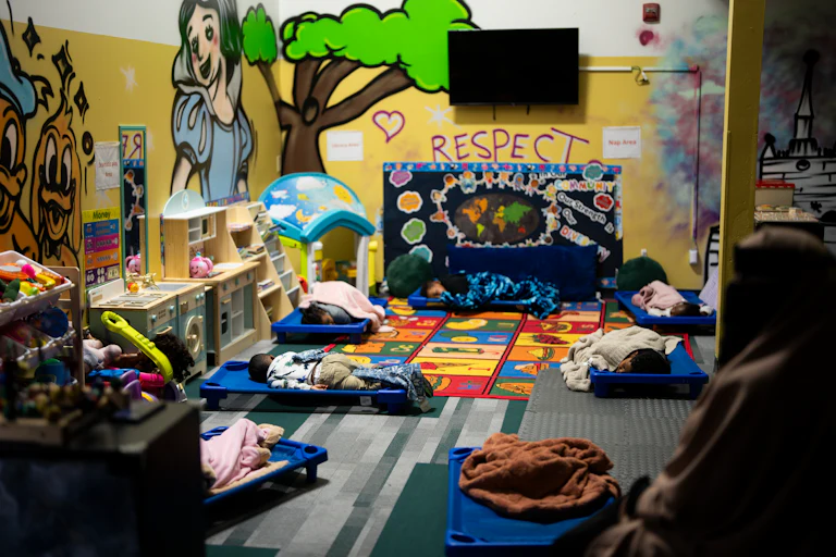 Children sleep during nap time at a daycare.