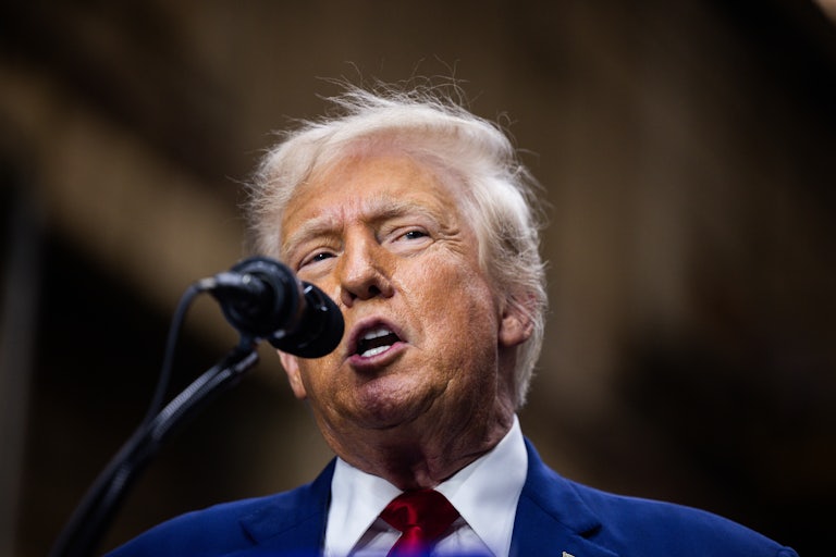 Donald Trump speaks at a mic