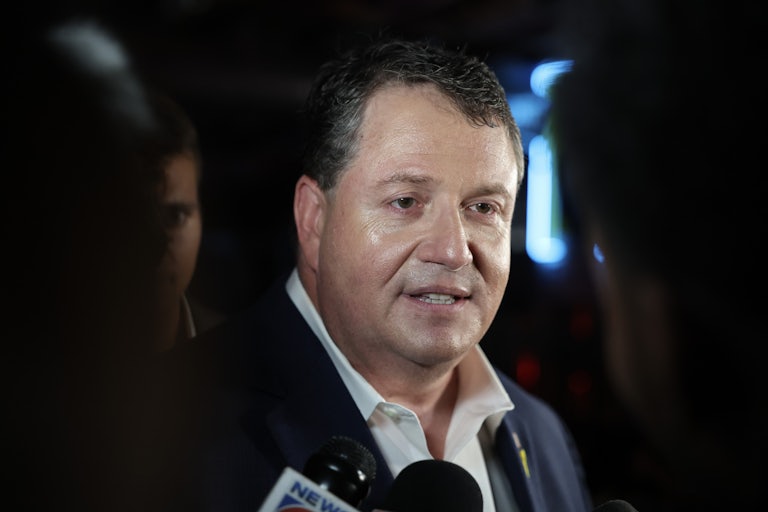 Representative Randy Fine speaks to reporters