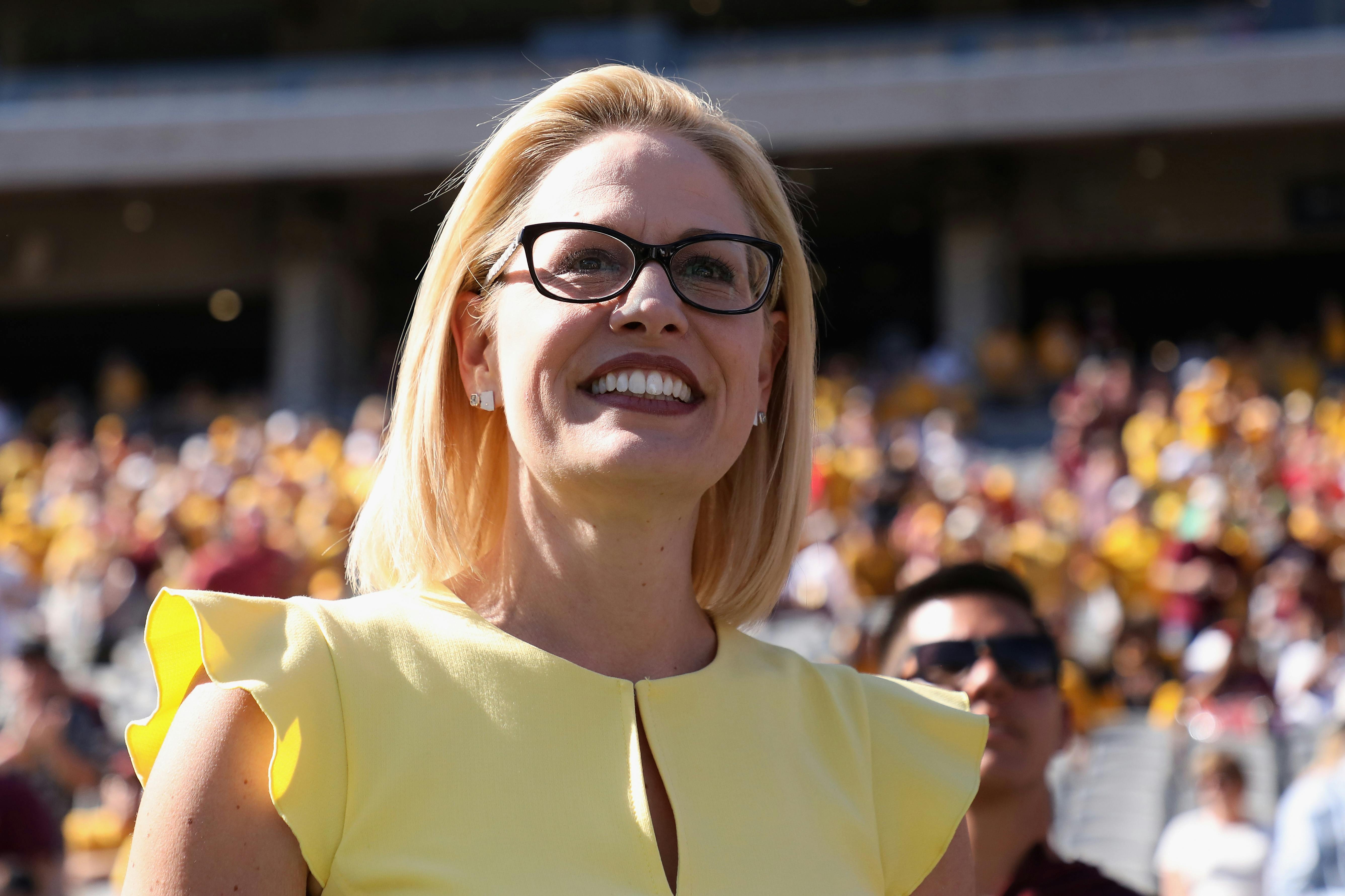 A close up of a smiling Arizona Senator Krysten Sinema