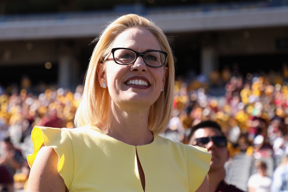 A close up of a smiling Arizona Senator Krysten Sinema