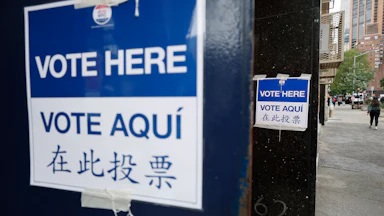 "Vote here" signs outside a polling station