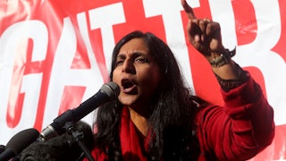 Seattle City Council member Kshama Sawant speaks at a rally held outside the U.S. District Courthouse in Seattle.
