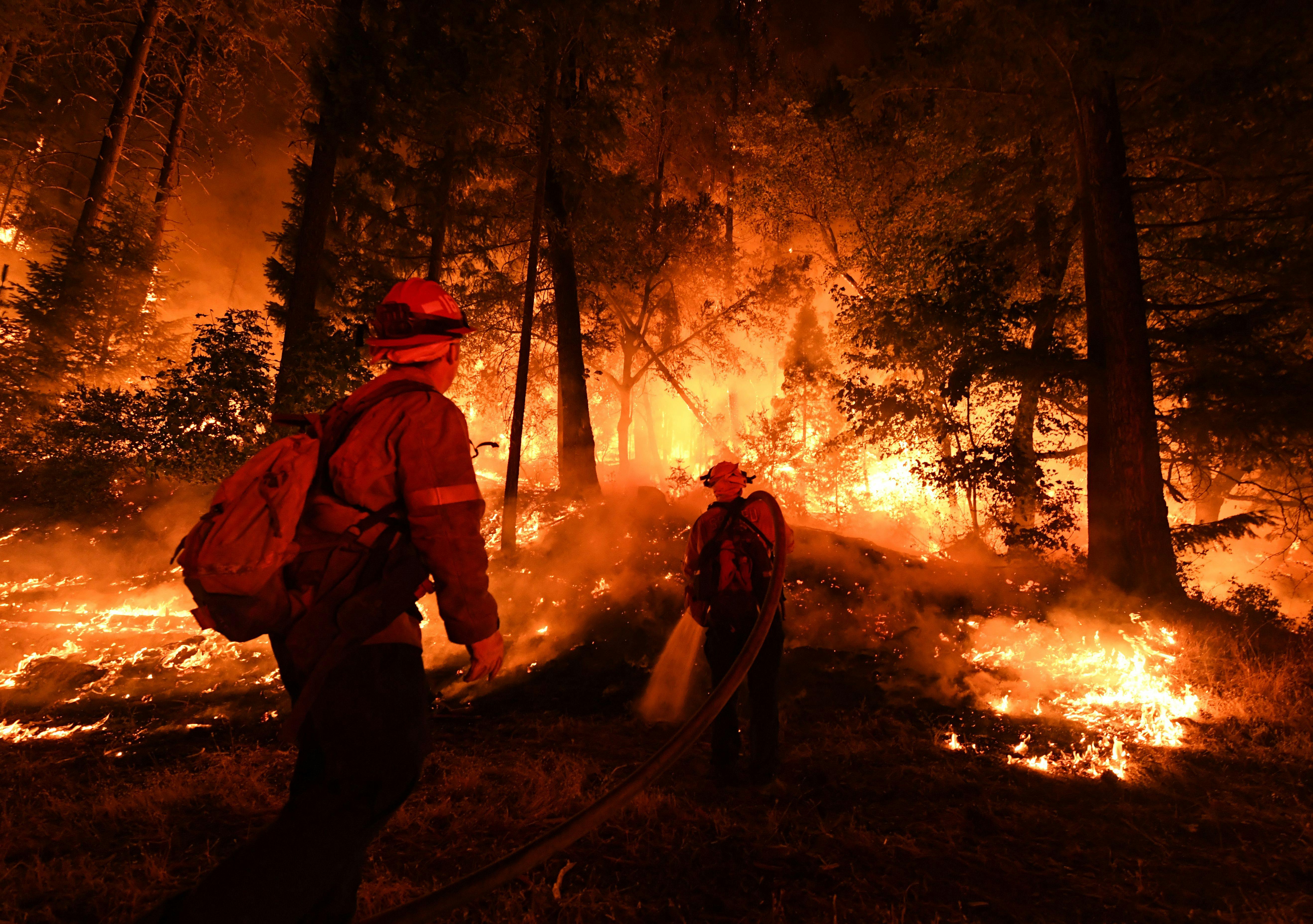 Firefighters battle the Carr fire in 2018. 