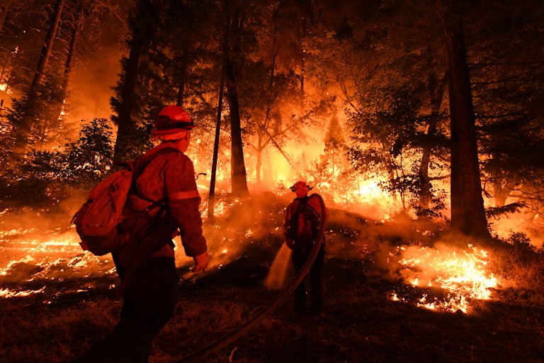 Firefighters battle the Carr fire in 2018. 