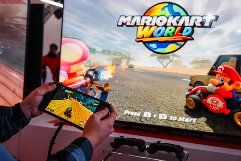 A gamer plays the upcoming Nintendo Switch 2 at a launch event