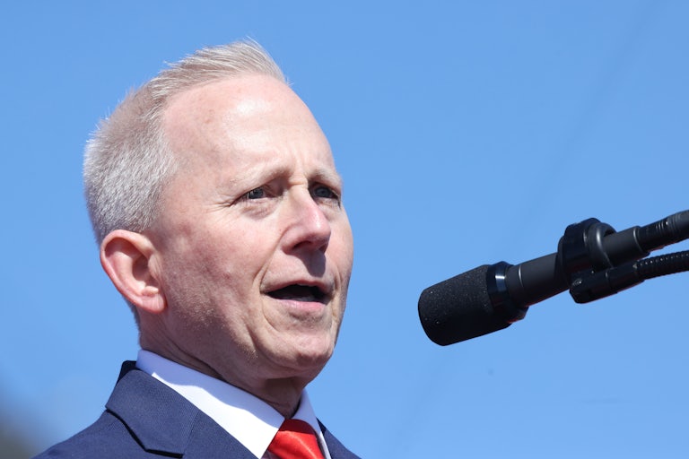 Representative Jeff Van Drew speaks into a microphone