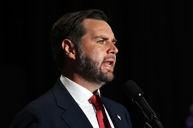 J.D. Vance speaks at a mic