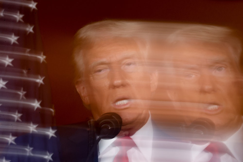 A blurred image of Donald Trump's face as he speaks at II Toro E La Capra on August 23, 2024 in Las Vegas, Nevada.