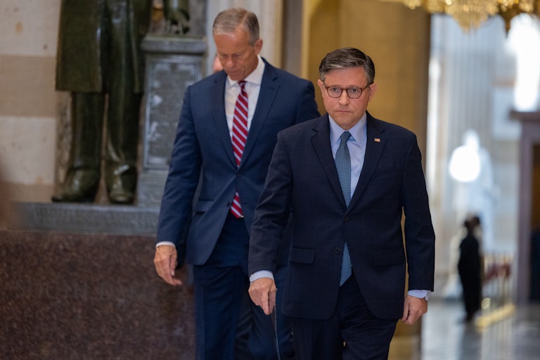 House Speaker Mike Johnson and Senate Majority Leader John Thune walk in the Capitol