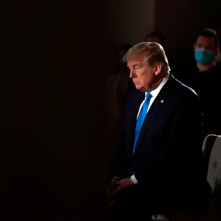 Donald Trump gestures during a commercial break of a Fox News virtual town hall.