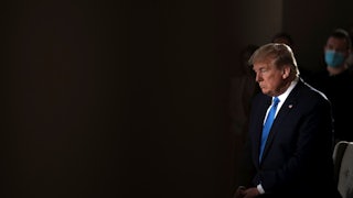 Donald Trump gestures during a commercial break of a Fox News virtual town hall.