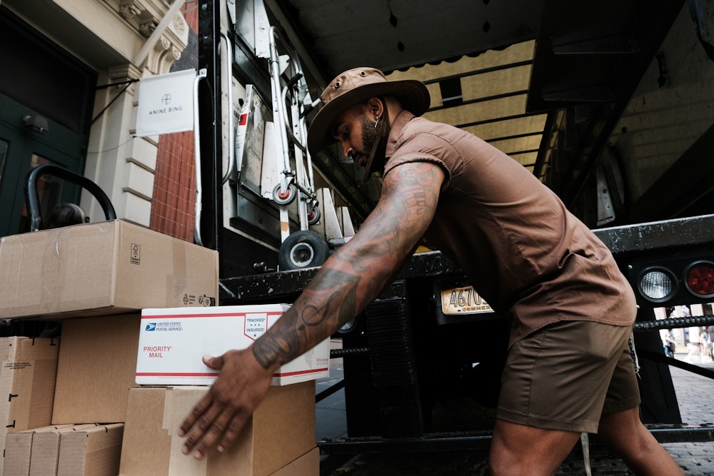 Carlos, a UPS worker in Manhattan, delivers packages