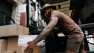 Carlos, a UPS worker in Manhattan, delivers packages