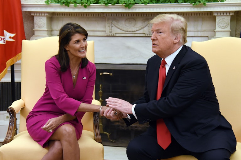 Nikki Haley puts her hand in Donald Trump’s.