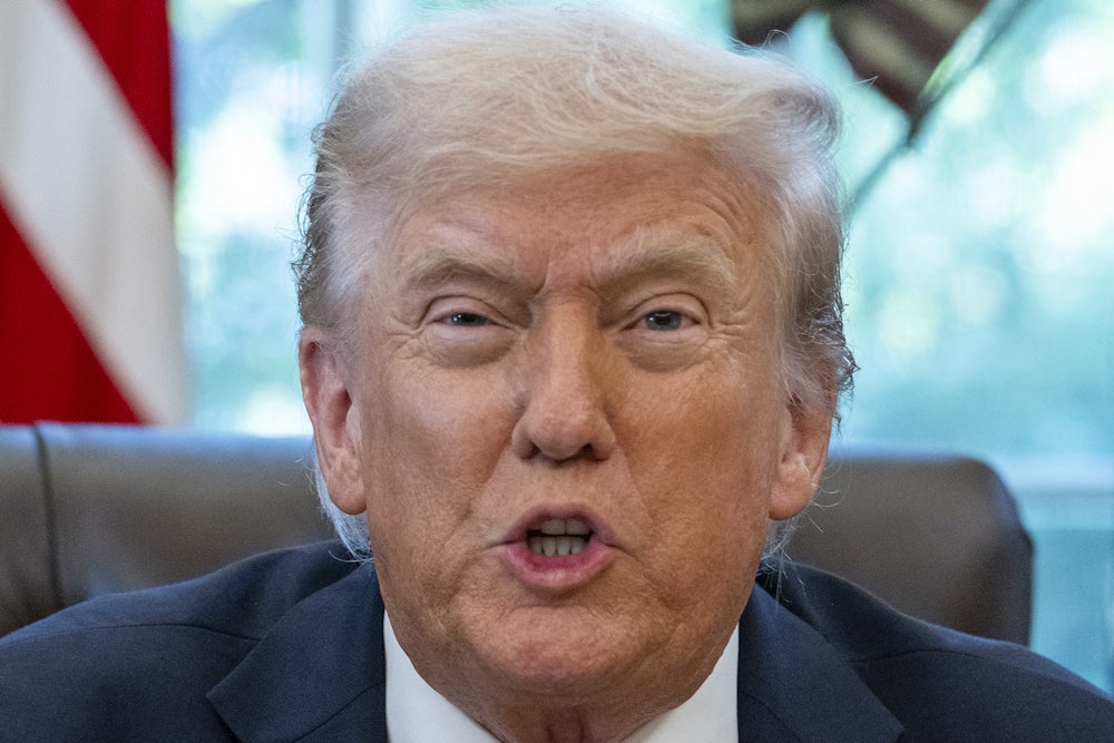 Donald Trump speaks after signing an executive order.