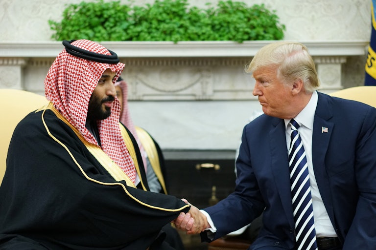 Donald Trump shakes hands with Saudi Arabia's Crown Prince Mohammed bin Salman in the Oval Office