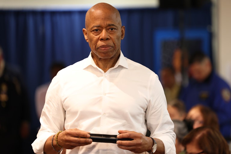New York City Mayor Eric Adams stands during a town hall in Queens