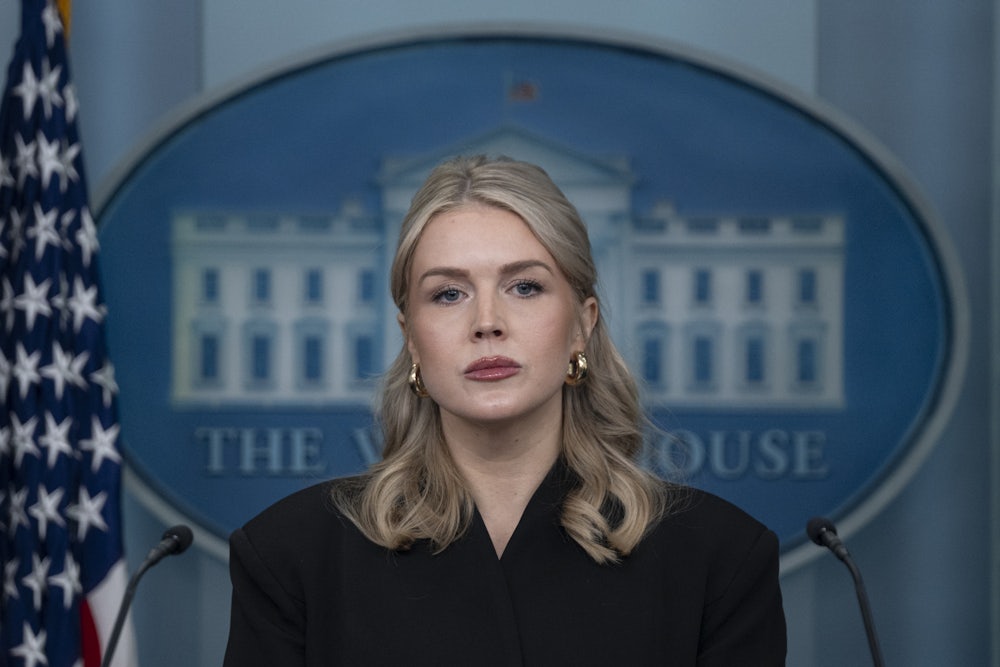 White House press secretary Karoline Leavitt stares ahead looking irritated