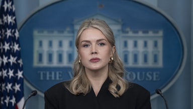 White House press secretary Karoline Leavitt stares ahead looking irritated