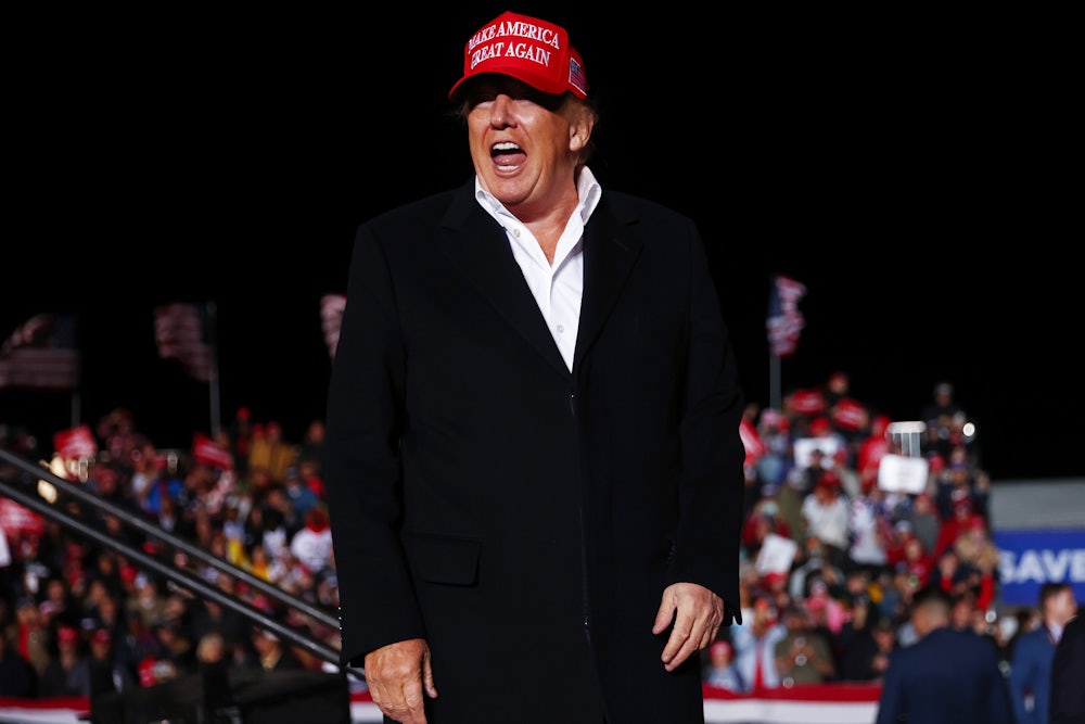 Former president Donald Trump shouts at a rally.