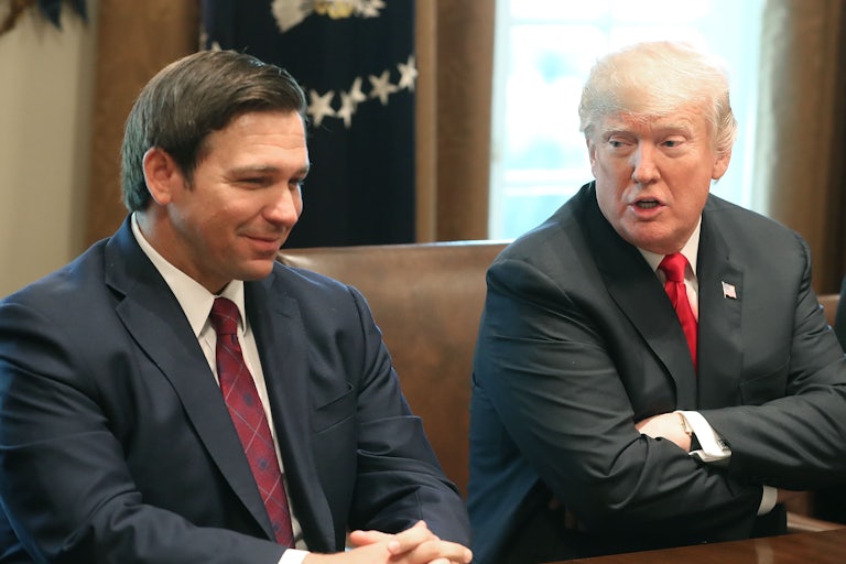 Donald Trump looks at Ron DeSantis