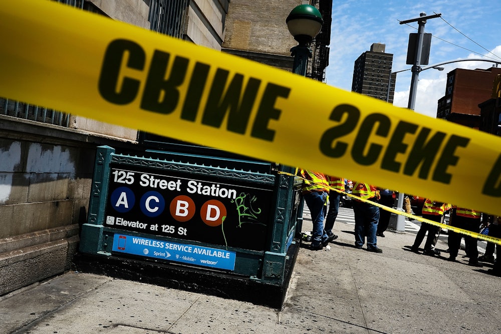 Police tape rings the scene at a subway station in New York City.