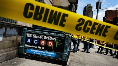 Police tape rings the scene at a subway station in New York City.