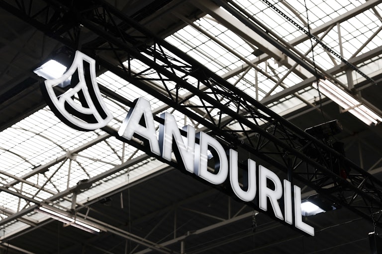 A neon sign of the Anduril logo