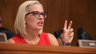 Kyrsten Sinema questions witnesses during a Congressional hearing on Capitol Hill