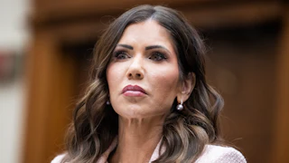 Former Homeland Security Secretary Kristi Noem looks down during a House committee hearing