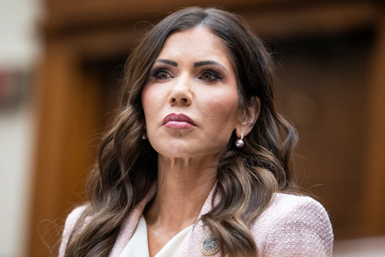 Former Homeland Security Secretary Kristi Noem looks down during a House committee hearing