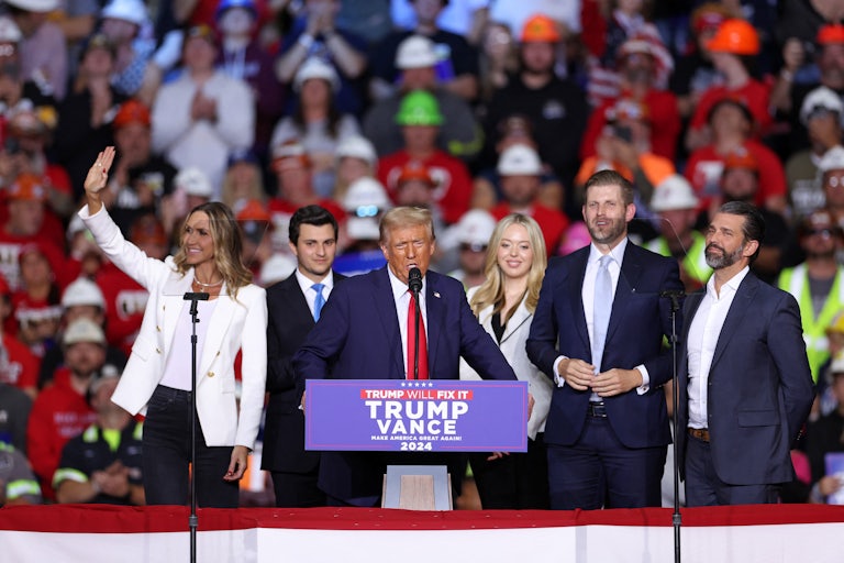 Donald Trump and several of his family members on a campaign stage