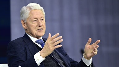 Bill Clinton speaks on a panel.