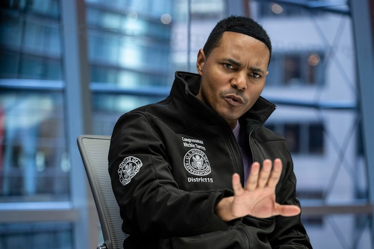 Representative Ritchie Torres speaks angrily and puts his hand out