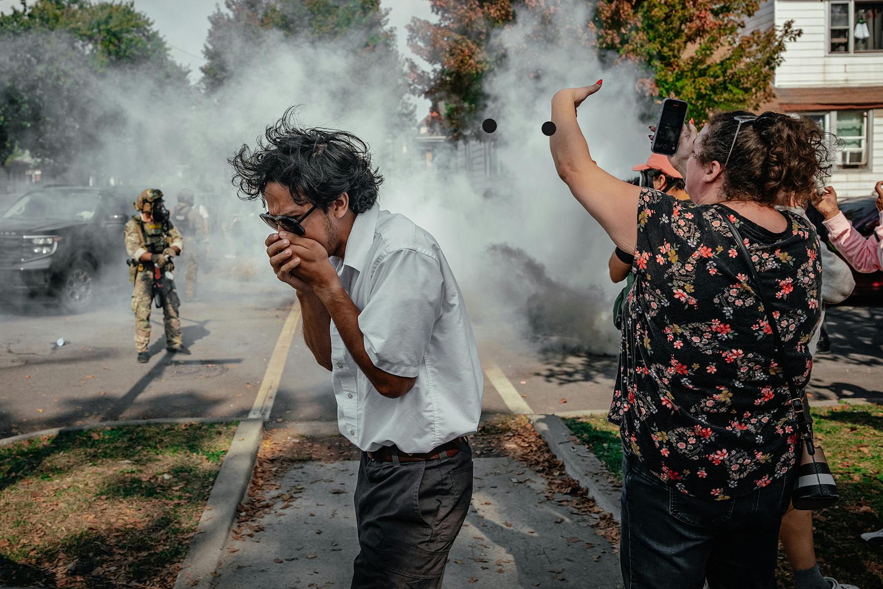 A photo from October 14, federal agents blanketed a neighborhood on the South Side of Chicago in tear gas.