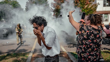 A photo from October 14, federal agents blanketed a neighborhood on the South Side of Chicago in tear gas.
