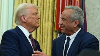 Donald Trump and Robert F. Kennedy Jr. shake hands in the Oval Office