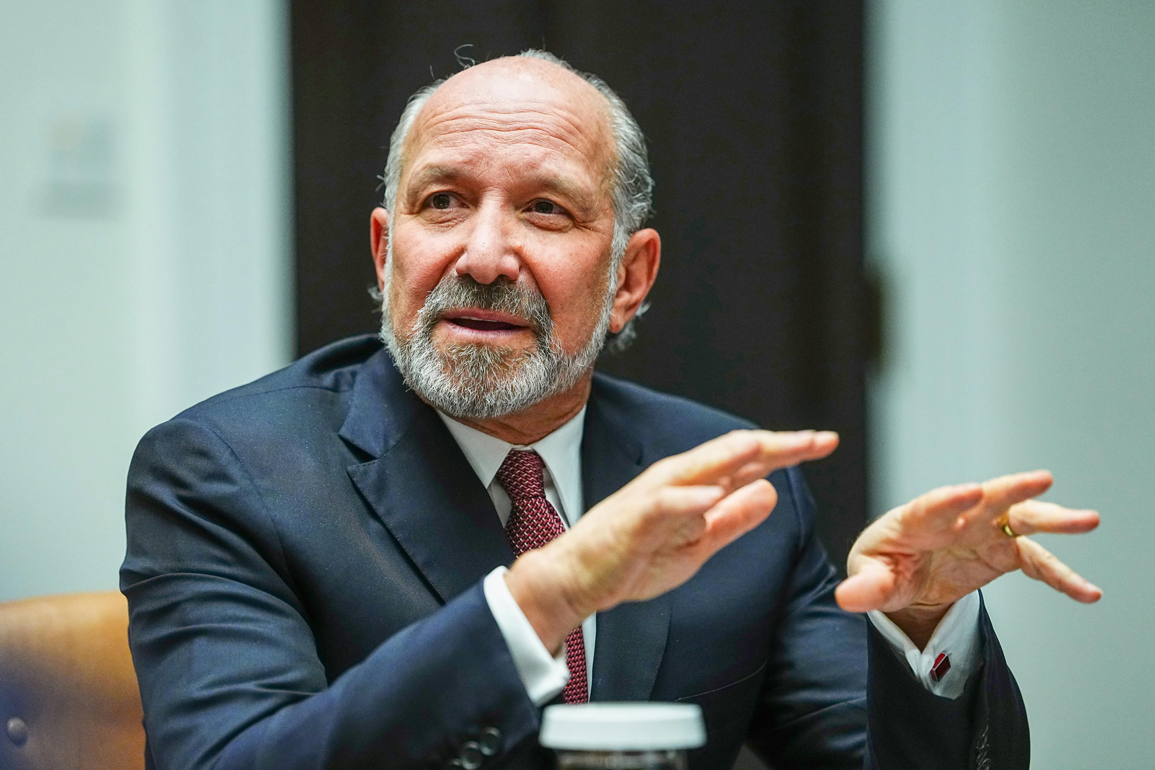 Commerce Secretary Howard Lutnick gestures as he speaks