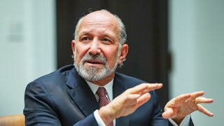 Commerce Secretary Howard Lutnick gestures as he speaks