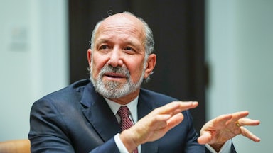 Commerce Secretary Howard Lutnick gestures as he speaks